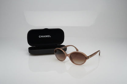 Chanel 5387 oval sunglasses in beige acetate with dark brown gradient lenses