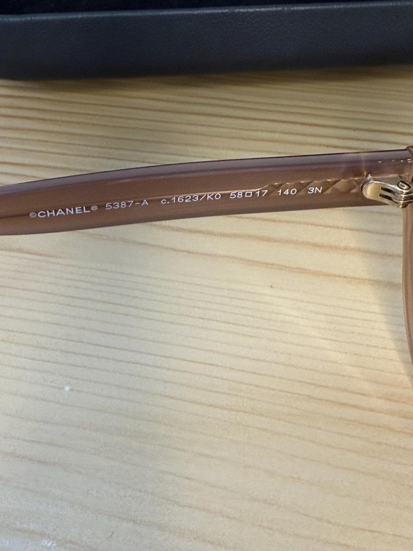 Chanel 5387 oval sunglasses in beige acetate with dark brown gradient lenses